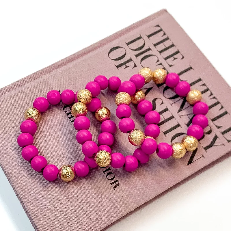 adjustable ladies bracelets & bangles-Set of Three | Making Joy Beaded Bracelets with Gold Tone Spacers in Fuchsia Pink