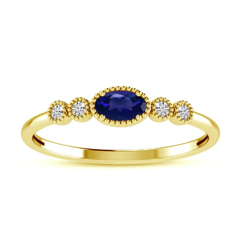 thick band ladies ring-YELLOW GOLD RING WITH OVAL SAPPHIRE AND ROUND CUT DIAMONDS, .06 CT TW