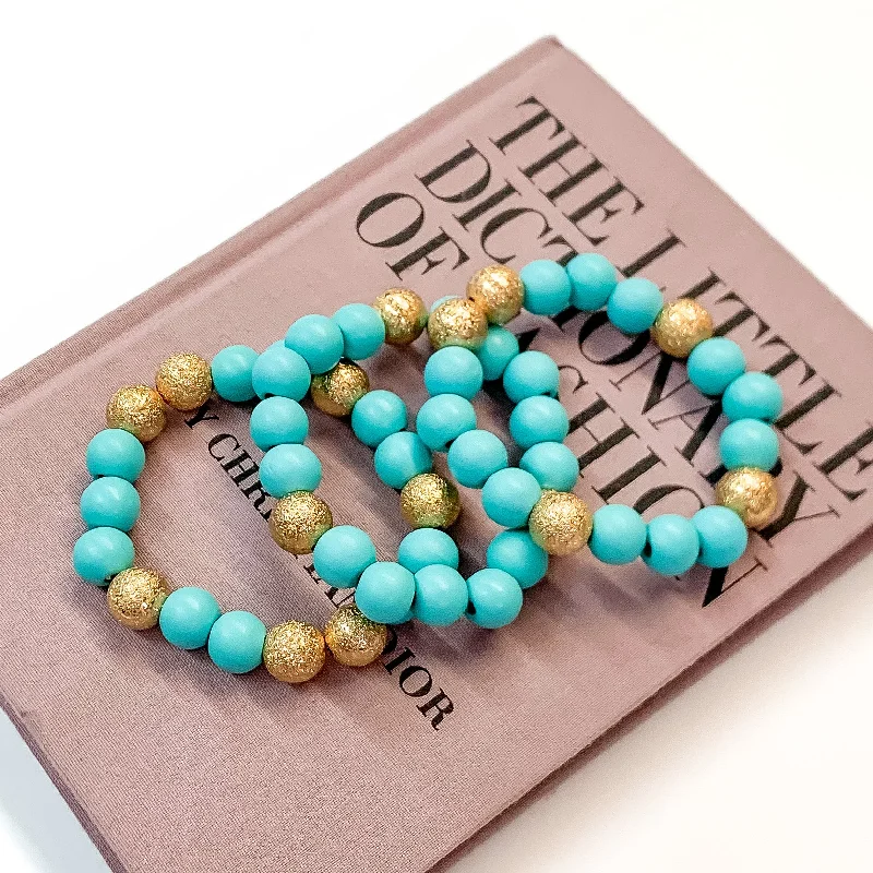 infinity symbol ladies bracelets & bangles-Set of Three | Making Joy Beaded Bracelets with Gold Tone Spacers in Sky Blue