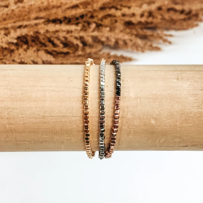 oval-cut ladies bracelets & bangles-Beaded Triple Strand Magnetic Bracelet in Silver, Gunmetal, Gold, and Rose Gold